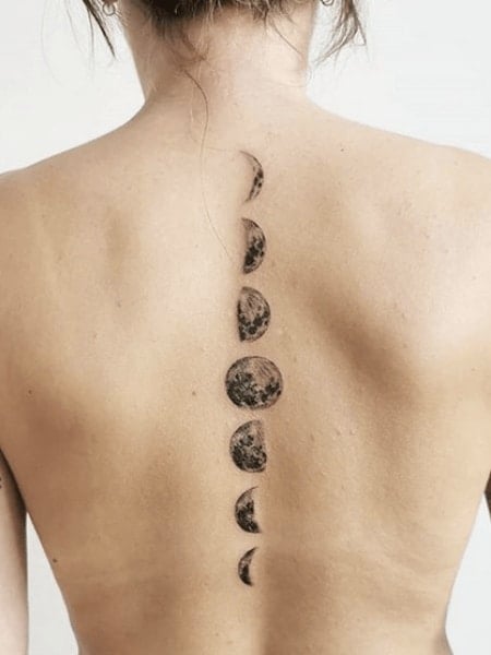 Moon Phases Spine Tattoo