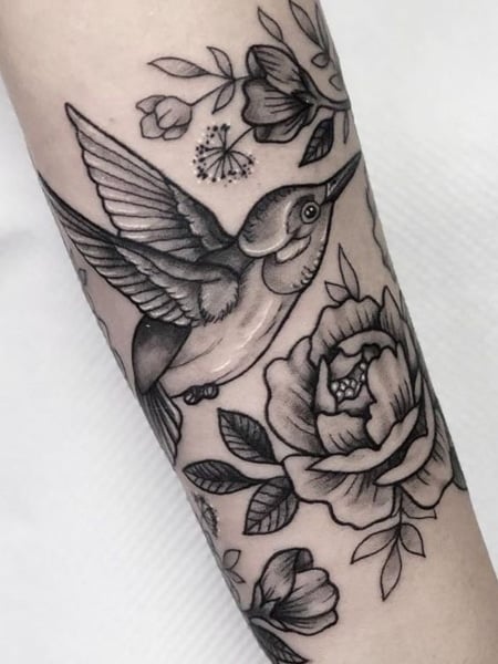 black white flower upper arm  Tiny Tattoo inc