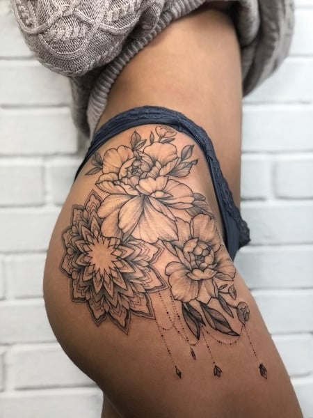 Mandala tattoo done on the hip