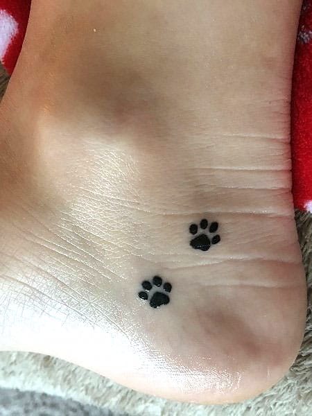 Paw Print Tattoo On Foot Women