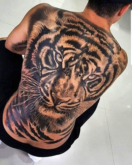 Share 68+ tiger spine tattoo best - in.coedo.com.vn