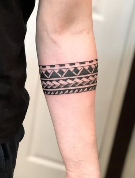 Native American Feather Armband Tattoo | Feather tattoos, Cool tattoos for  guys, Tattoos for guys