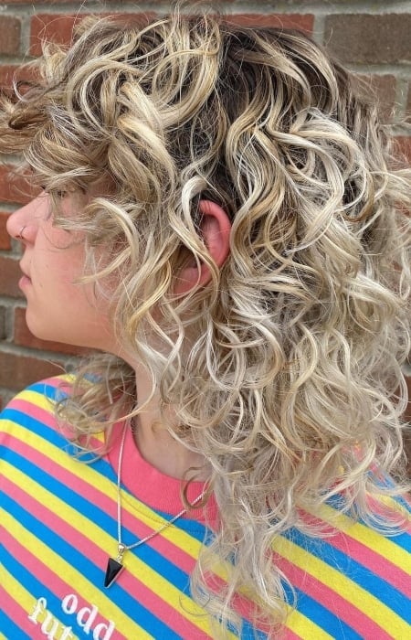 Curly Wolf Cut With Highlights
