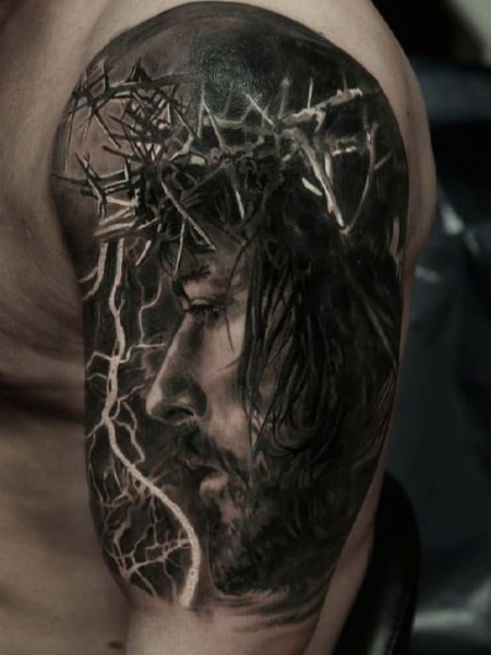 realistic black and grey baby Jesus tattoo Scott Grosjean Art Junkies  Tattoo by Scott Grosjean TattooNOW