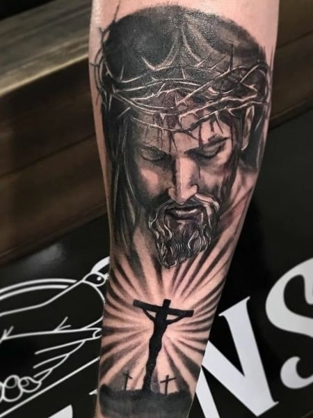 Half Sleeve Jesus Tattoos For Men Lower Arm on Stylevore