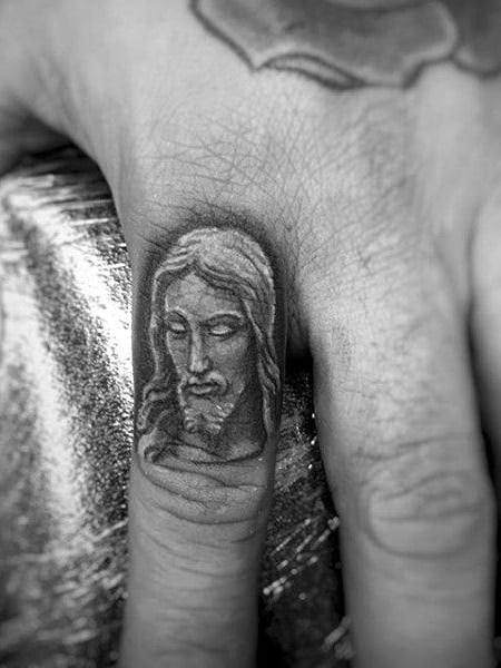 Jesus Finger Tattoo