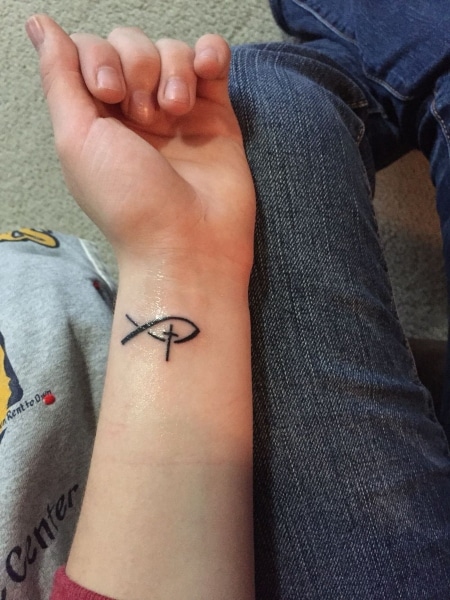 christian fish symbol with cross tattoo