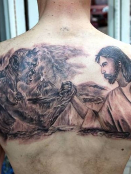 Saint Mary and Jesus Tattoo on arm