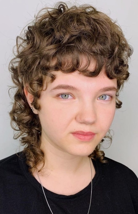 Very Curly Wolf Haircut With Volume