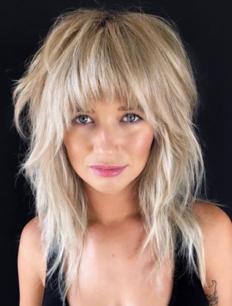 Kimberly Caldwell's medium long haircut with texturized layers and a messy  disorder