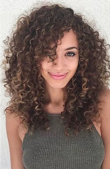 Medium Length Curly Hair With Side Fringe