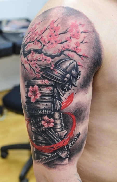 Japanese painterly color tattoo samurai and cherry blossom tree  Blossom  tattoo Blossom tree tattoo Cherry tree tattoos