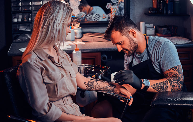 Tattoo Master Is Creating New Tattoo For Customer