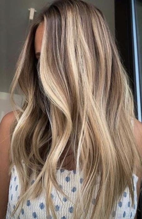 Best Hair Colours To Look Younger : Caramel highlights for long layers
