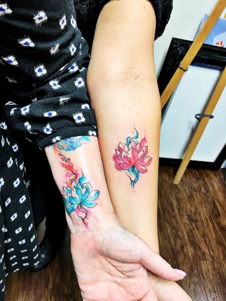 Matching lotus tattoos on ankles  Tattoogridnet