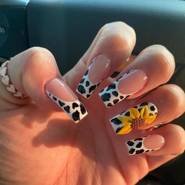 Cow Print And Sunflower Nails