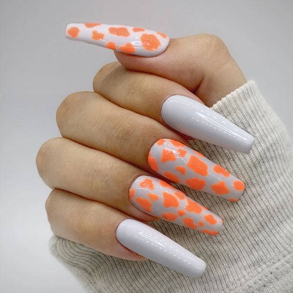 Orange Cow Print Nails