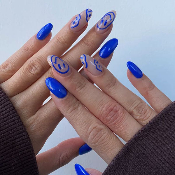 Blue Smiley Face Acrylic Nails