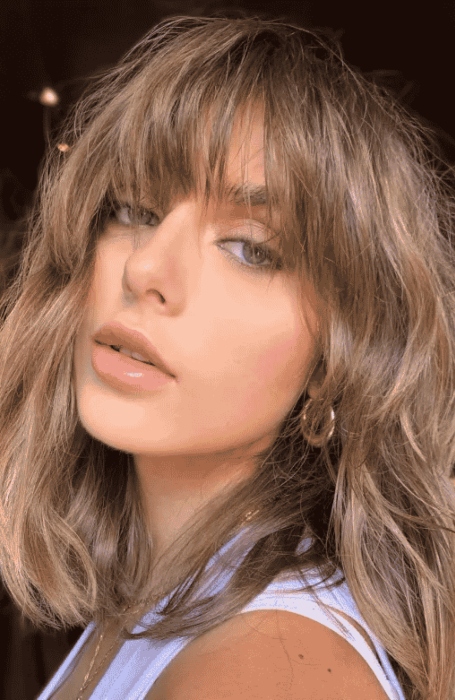 How to Style Wispy Bangs Like a Hairstylist