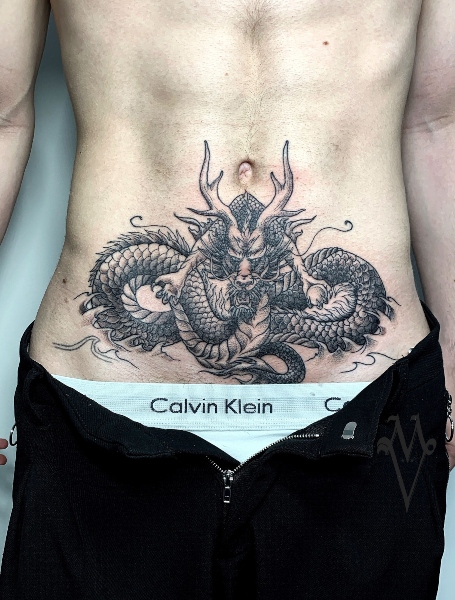 side stomach tattoos for men