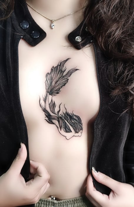 Unique Sternum Tattoo