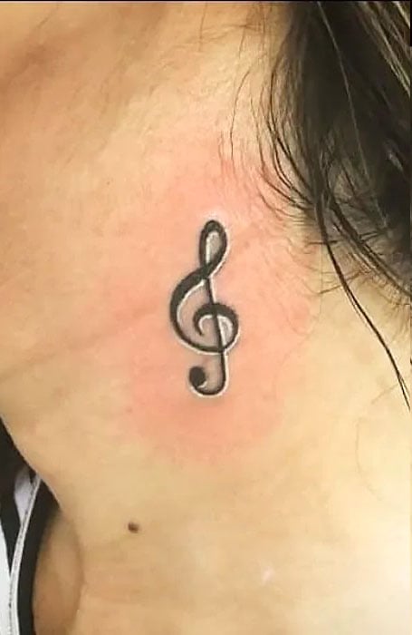 Tattoo uploaded by Samurai Tattoo mehsana  Music symbol tattoo Music  tattoo Tattoo on neck Neck tattoo  Tattoodo