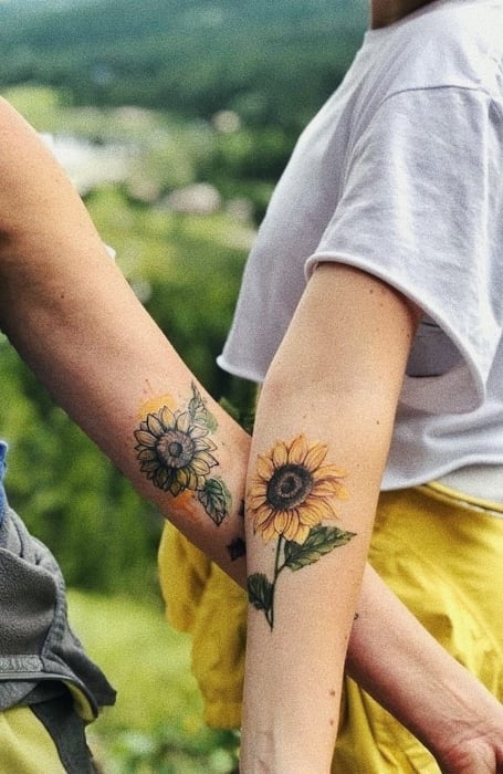 Tattoo uploaded by Kennedy Batten  youaremysunshine myonlysunshine  motherdaughtertattoo motherdaughter mother daughter matchingtattoos  matching song childhoodsong sunflower flower   Tattoodo