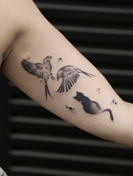 Cat And Bird Tattoo