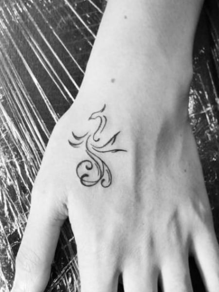 Phoenix Hand Tattoo