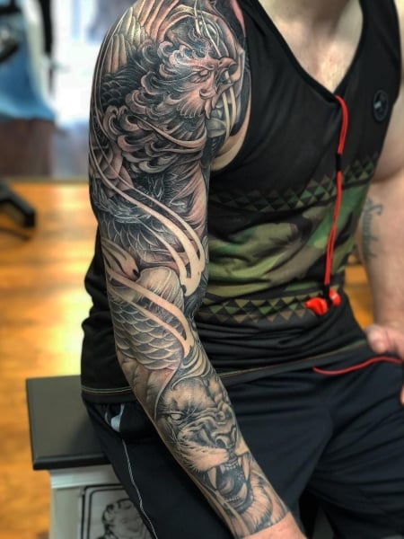 Phoenix Sleeve Tattoo