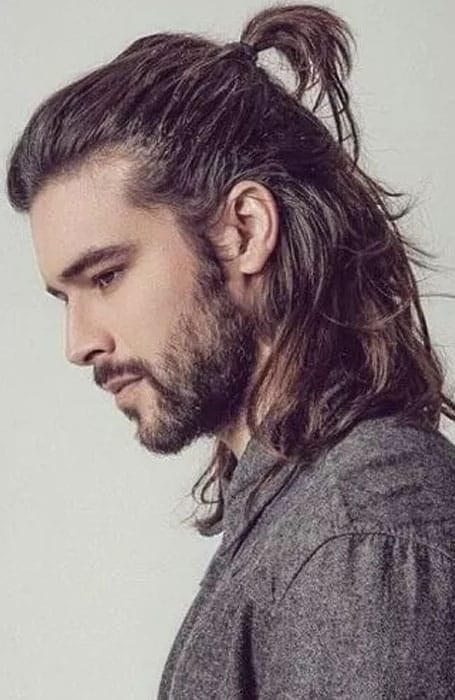 Image of Messy Ponytail hairstyle for boys