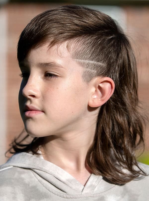 Side view of an 11-year-old boy with red hair on Craiyon