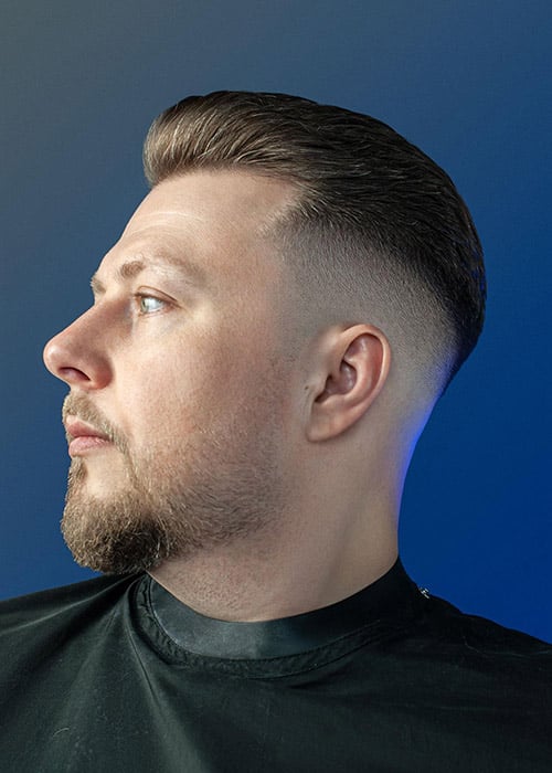 Skin Fade With Combed Back Hair