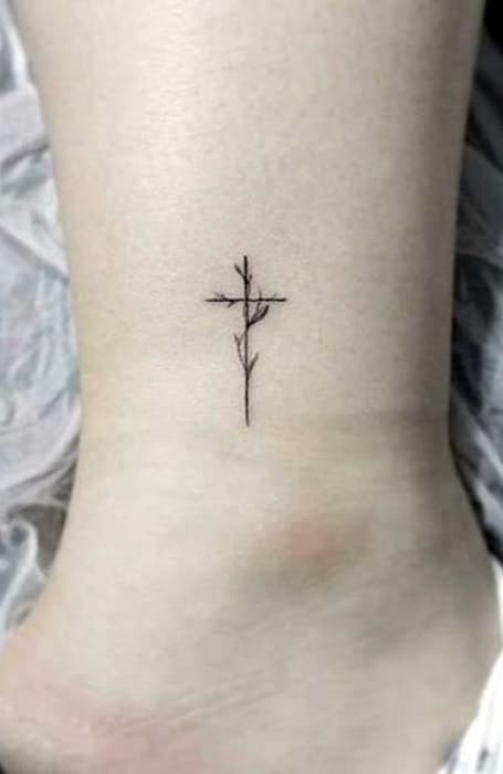 Tiny Cross Tattoo 1