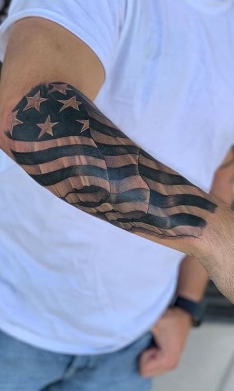 Black American Flag Forearm Tattoo