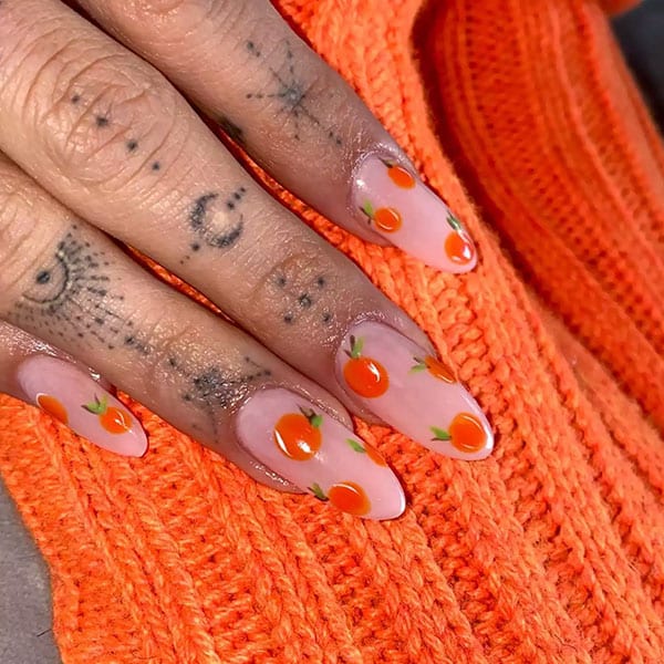 Hailey Bieber Orange Nails