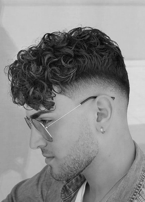 Low taper fade curly hair