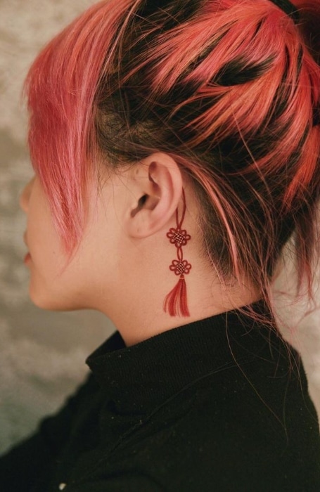 Red Chinese Tattoo Behind Ear