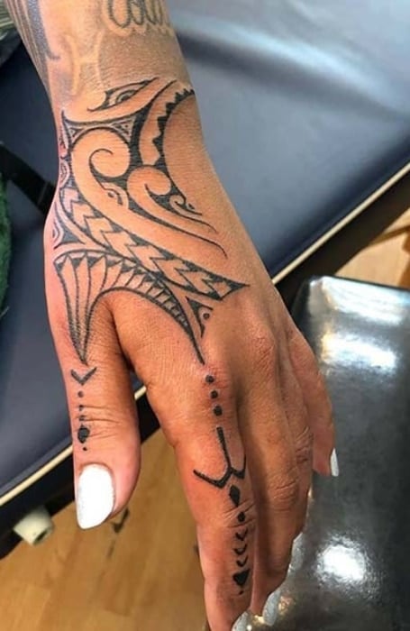 simple tribal hand tattoo