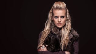 Portrait Of Viking Woman In A Traditional Warrior Clothes.