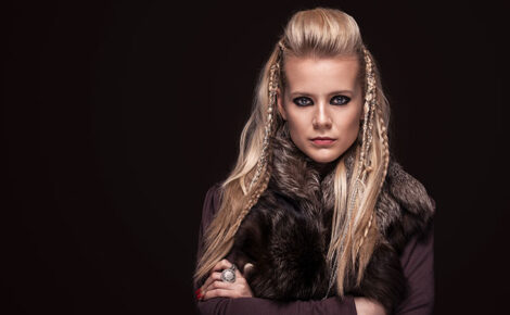 Portrait Of Viking Woman In A Traditional Warrior Clothes.