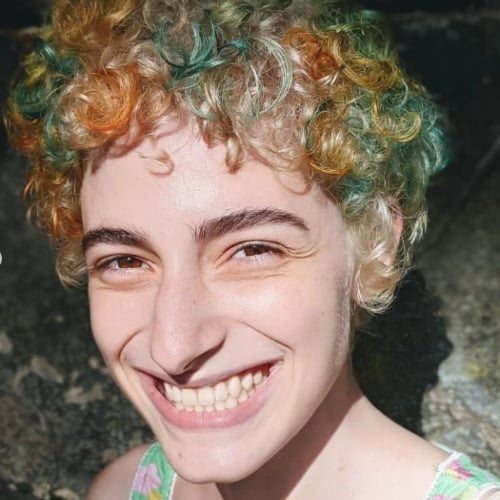 Curly Pixie Cut With Hair Color